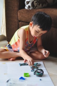 absorbed playing  hinnamsaisuy freedigitalphotos 198x300 Why your kids dont listen – and how to deal with it